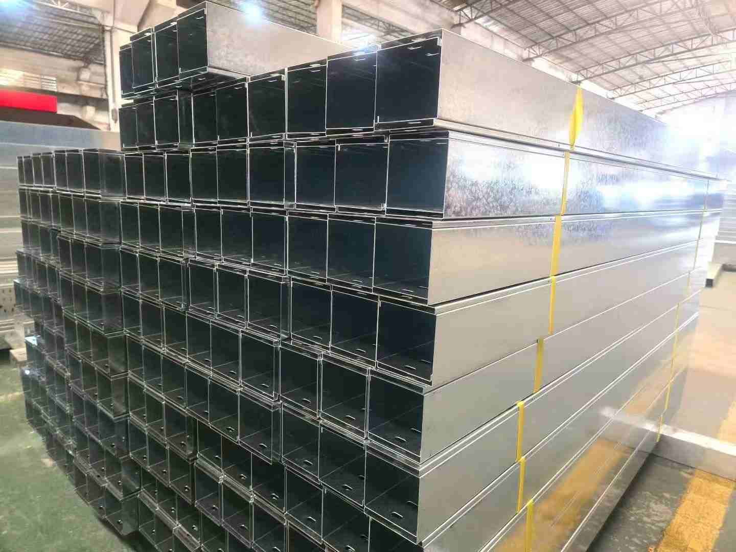Trough-type cable tray with solid bottom and side walls shielding cables from dust and impact (ID#3)
